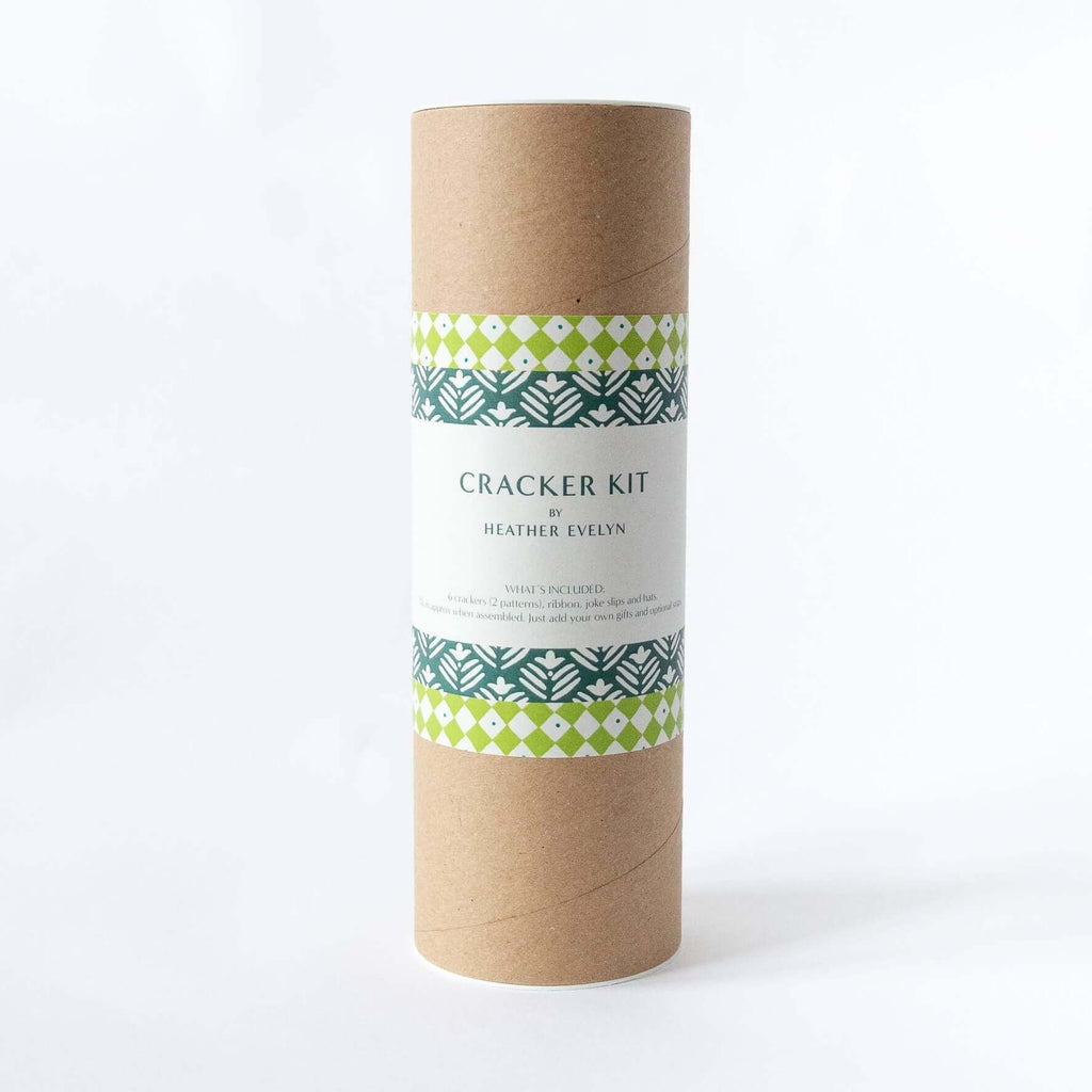 Cardboard tube with patterned label on a white background