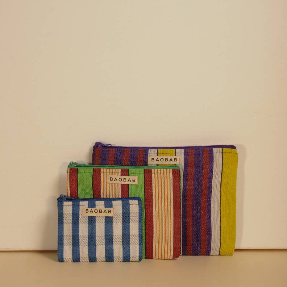 Three striped pouches with 'Bacca Bucci' branding on a beige background