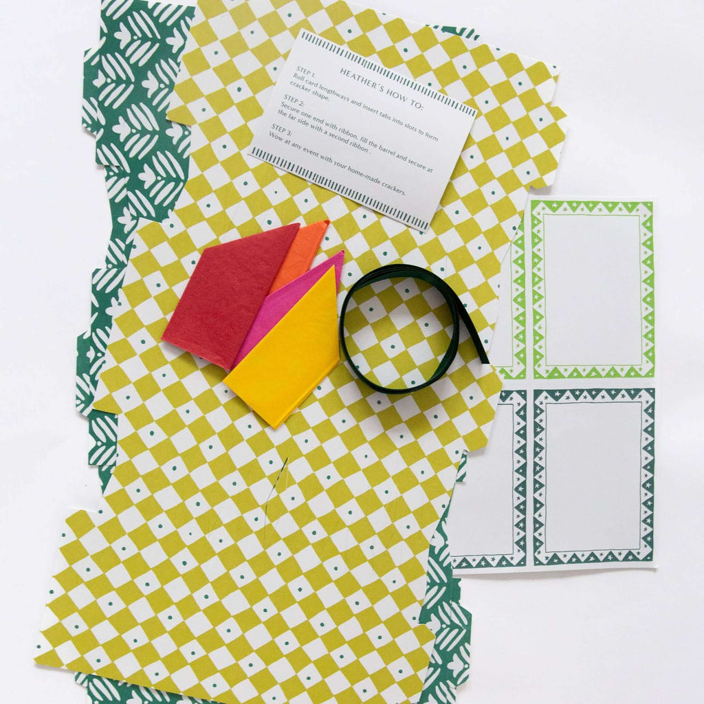 Colorful stationery items including a notebook, pen, and cards on a white background