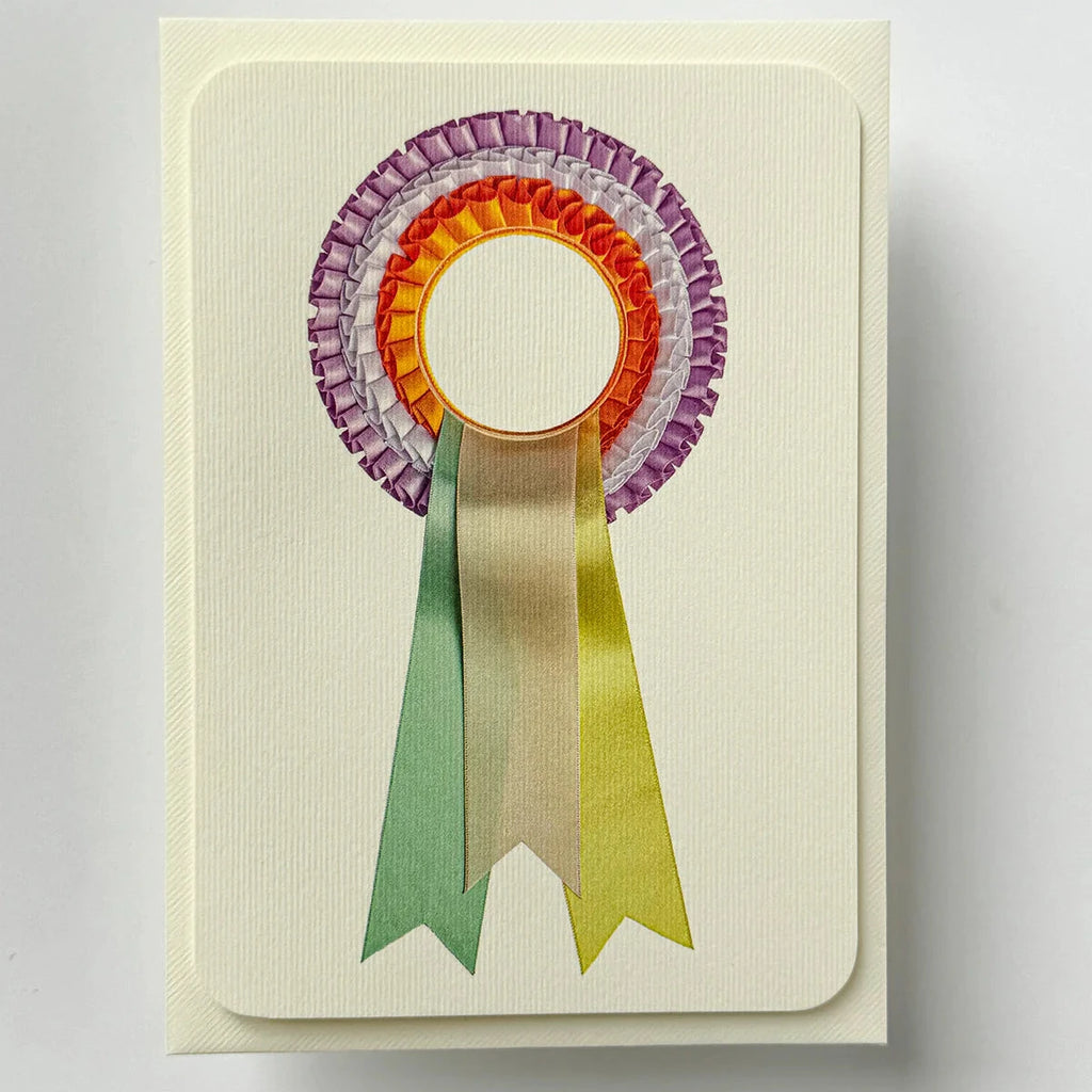 Greeting card with a colorful ribbon design on a white background