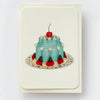 Card with a blue cake illustration featuring a cherry on top, on a white background